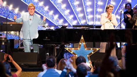 elton john blue glasses